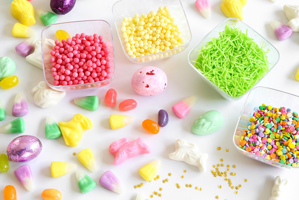 A neatly organized spread of assorted unwrapped Easter candies