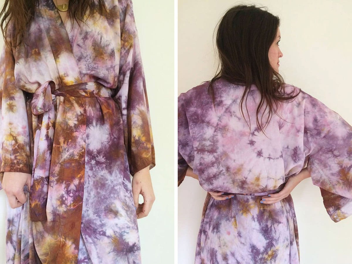 A purple and rust tie-dye robe on a model.