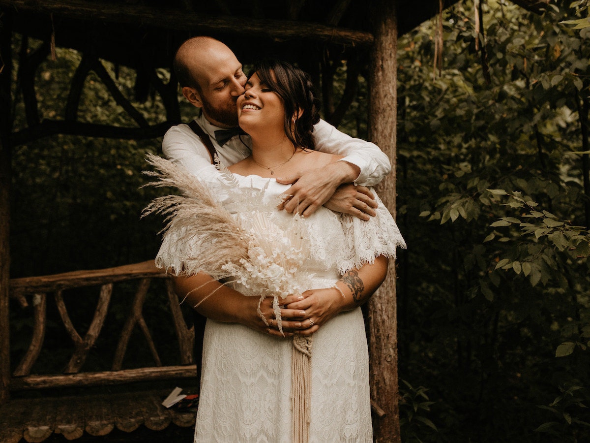 Sarah and Chris Schalago embrace on their wedding day.