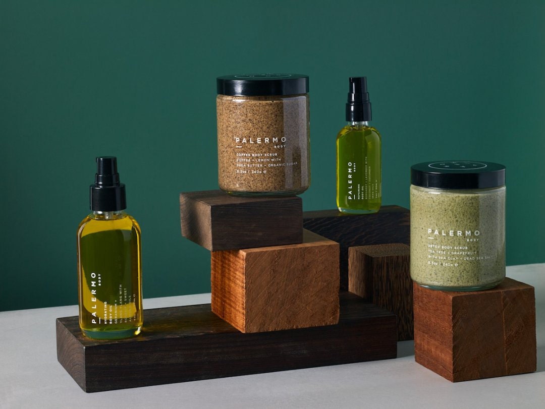 Curated image with hydrating body oil, from $39, coffee body scrub, $56, detox body scrub, $56, all from Palermo Body