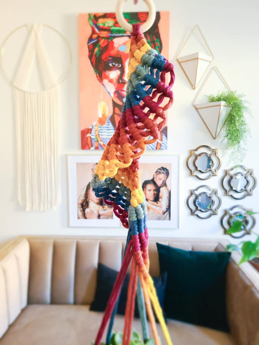 Detail on a spiral rainbow macrame plant hanger from Sweet Home Alberti