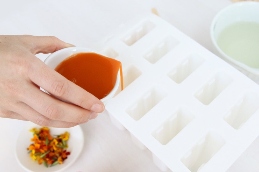 pour a base layer into the mold