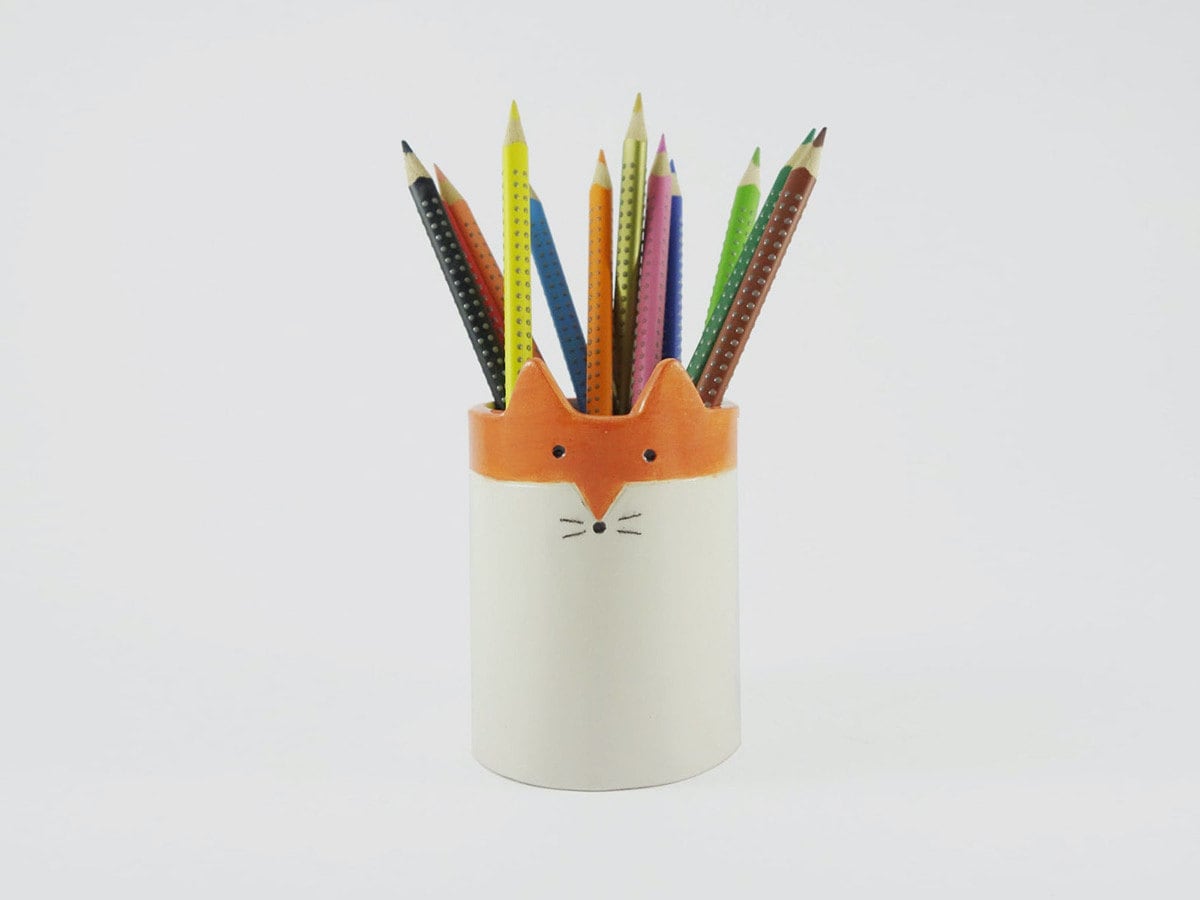 A fox-shaped pencil holder from Minky Moo Ceramics.