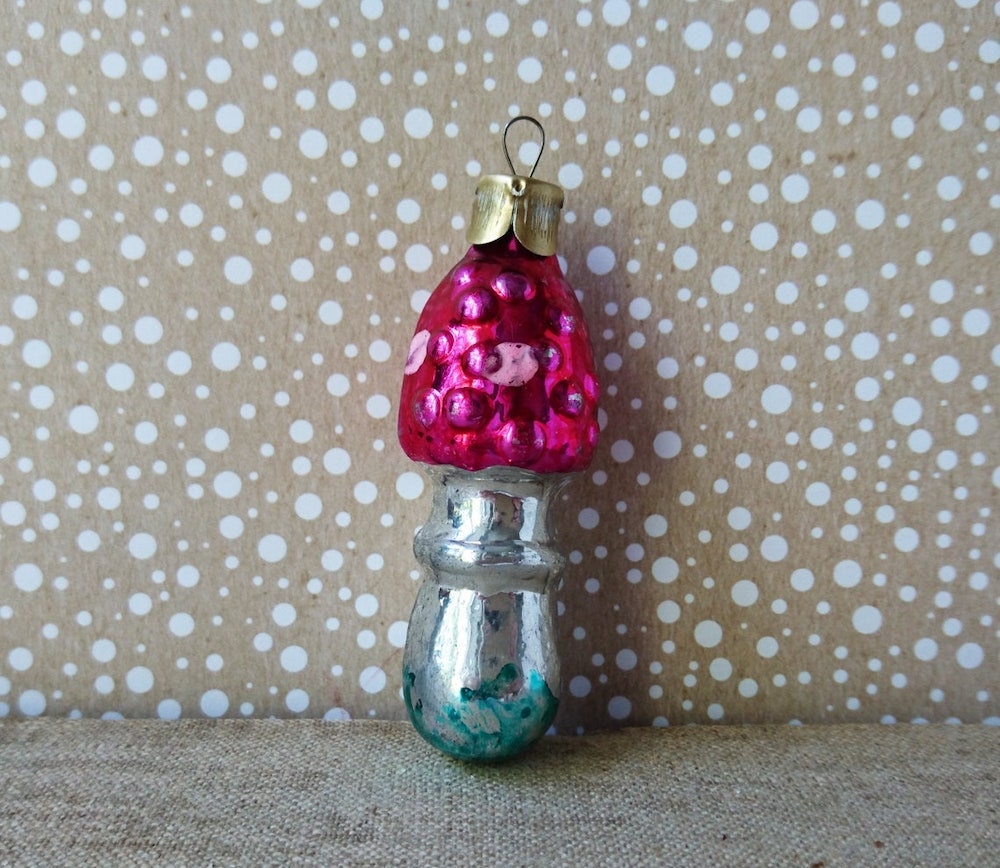 A vintage mercury glass mushroom ornament from Mysterious Suitcase on Etsy