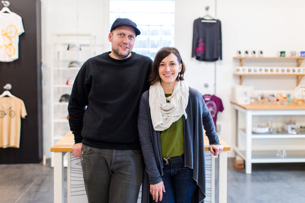 A portrait of Vital Industries shop owners and designers Brett Childs and Crystal Hanks Childs in their Wisconsin shop.