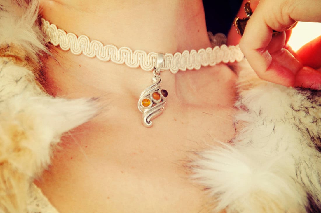 An amber and silver necklace pendant from KK Vintage Collection