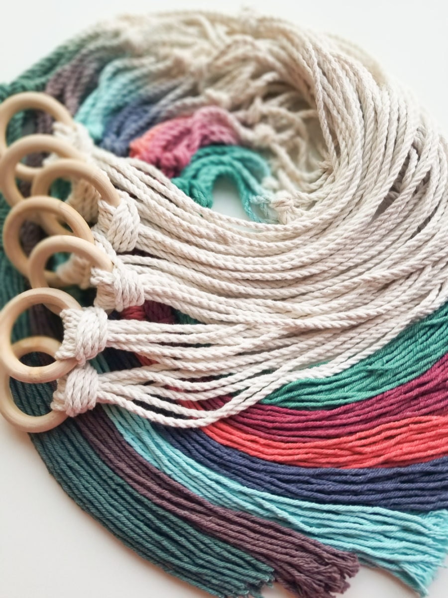 A rainbow of colorful fiber tassels.