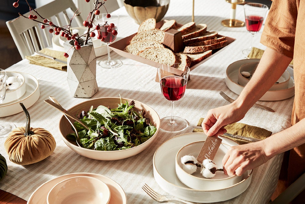 A festive table set for dinner and ready for seasonal entertaining