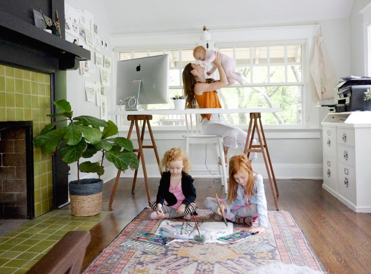Samantha in her studio with her three children
