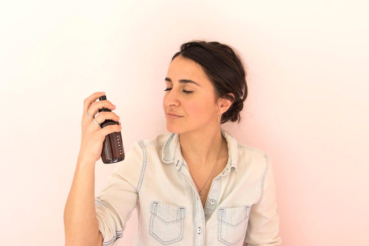 Jessica demonstrates how to spritz on her facial mist