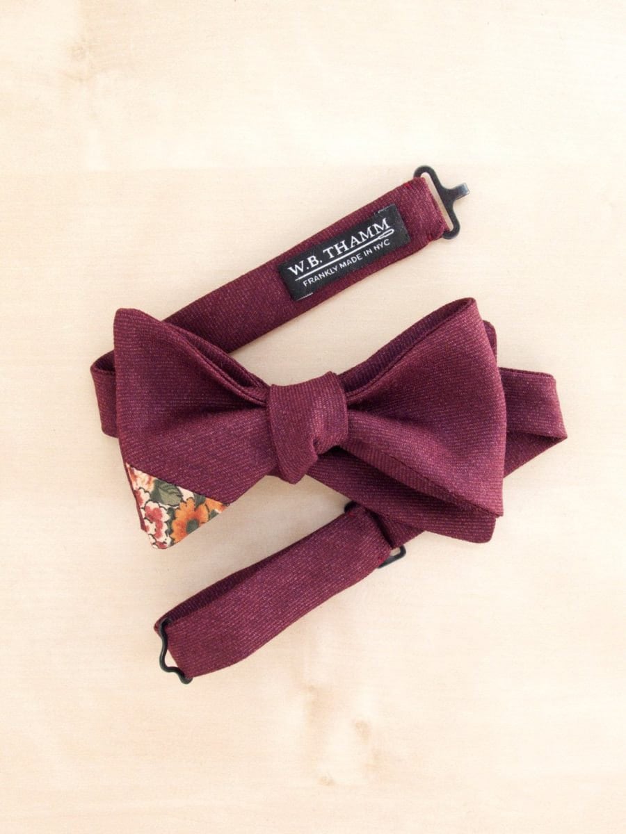 A red wool floral-tipped bow-tie from W.B. THAMM
