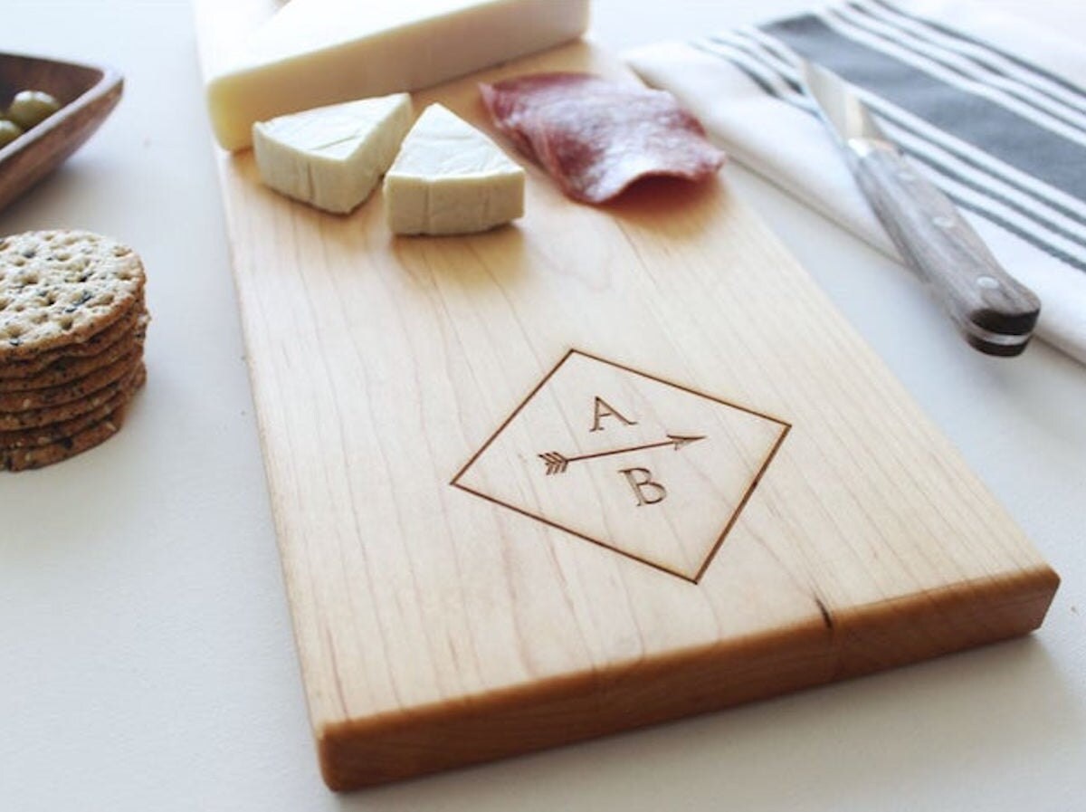 Custom cheese board from Sugar Tree Gallery, and other personalized Father's Day gifts from Etsy