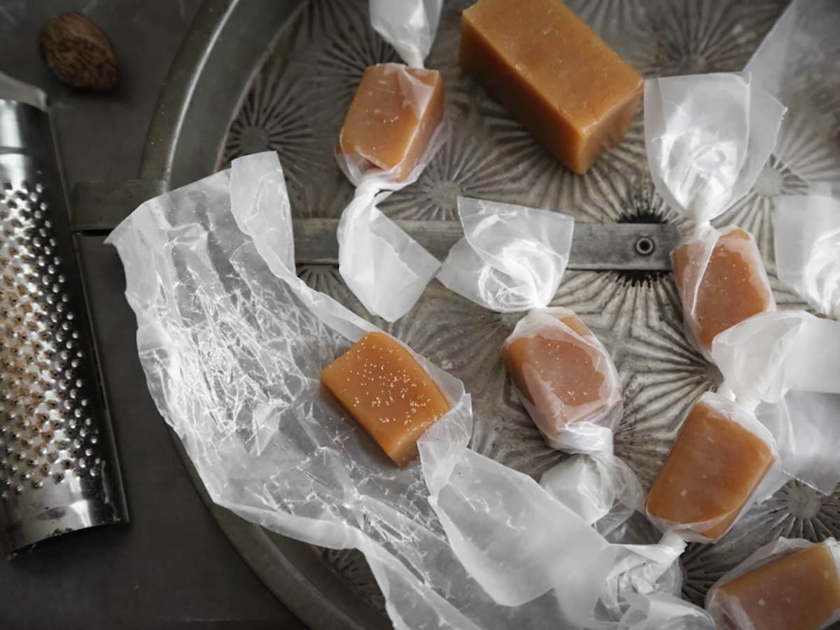 Homemade apple cider caramels in wrappers