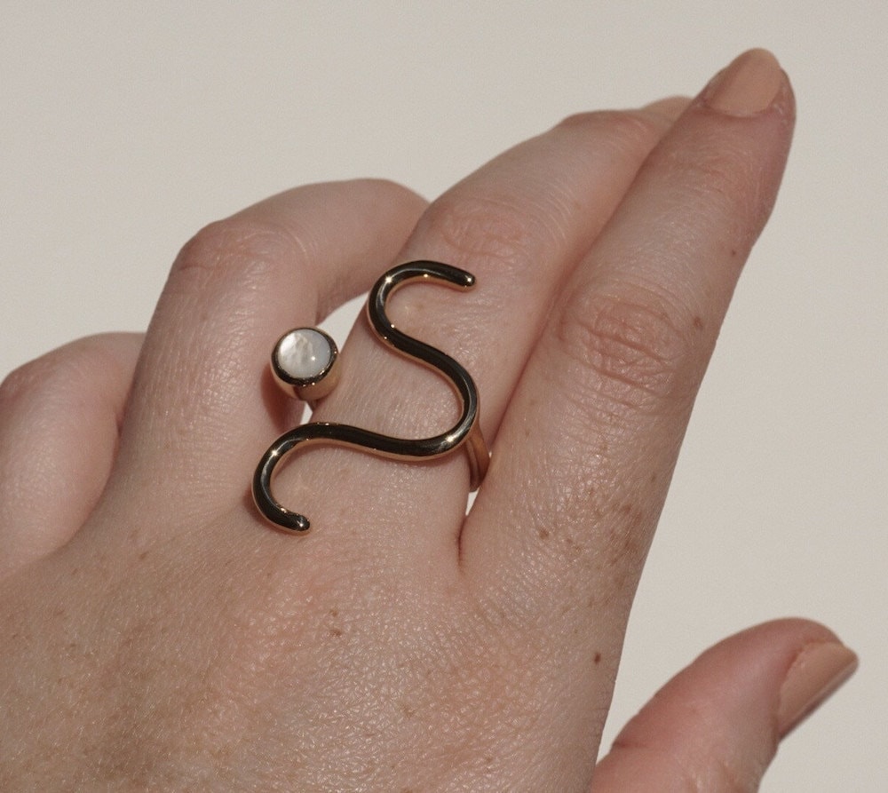 A mother of pearl squiggle ring from Aleishla