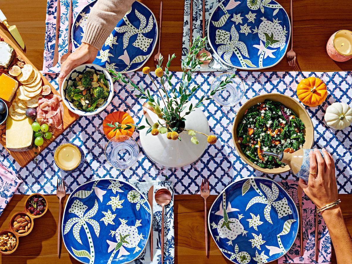 A festive tablescape styled with pieces from the Roller Rabbit x Etsy collection