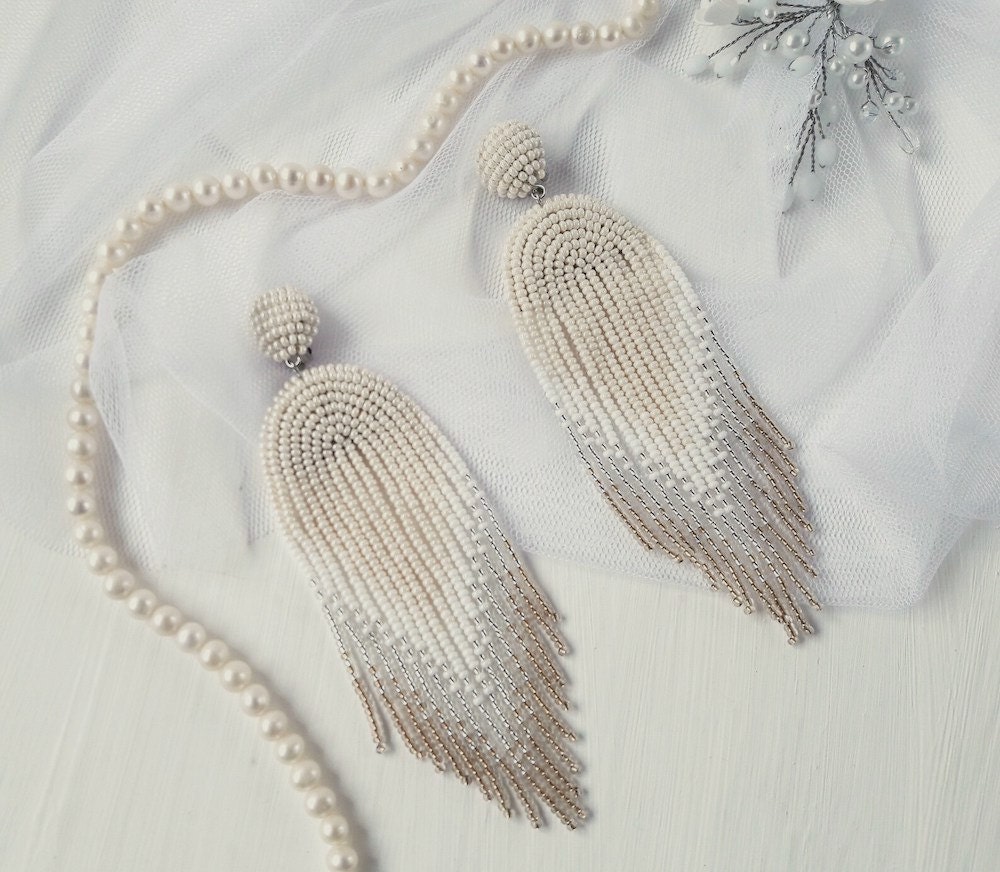 A pair of boho bridal statement earrings from Beaded Splendour on Etsy