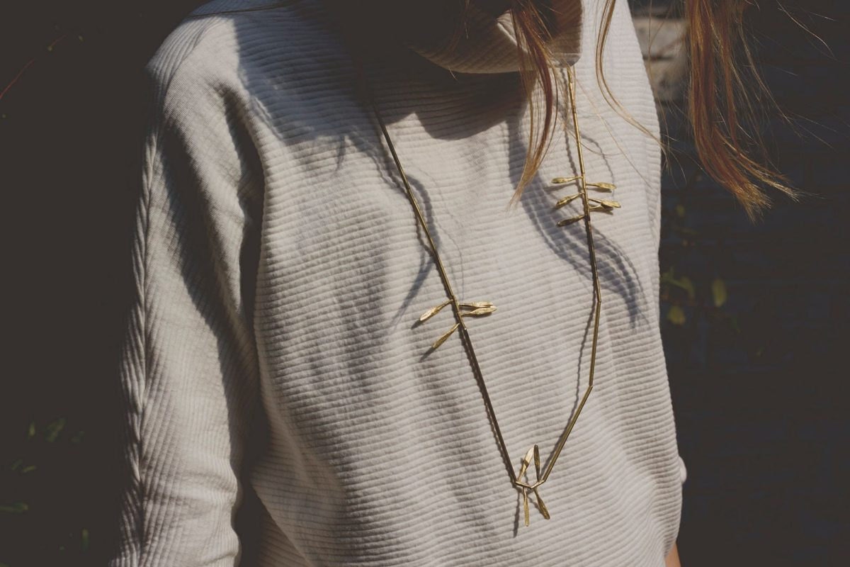 A delicate brass leaf necklace from Mai Solorzano