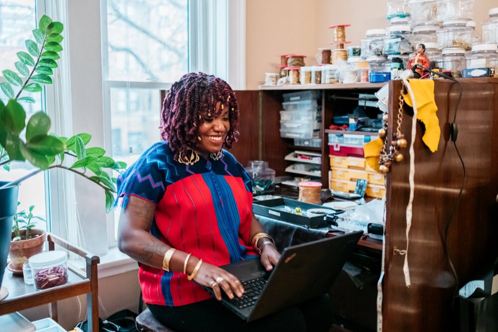 Alicia works on her computer