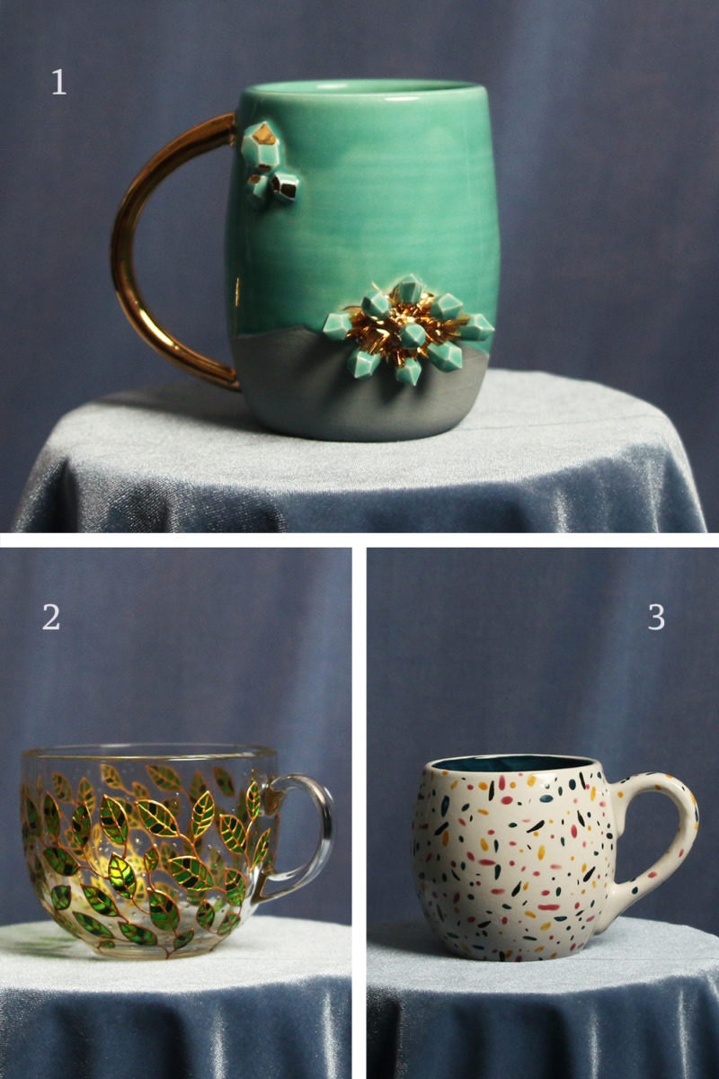 A collage of mugs for air signs, including a crystal-encrusted mug for Aquarius, a glass mug with a hand-painted leaf motif for Libra, and a colorful confetti mug for Gemini