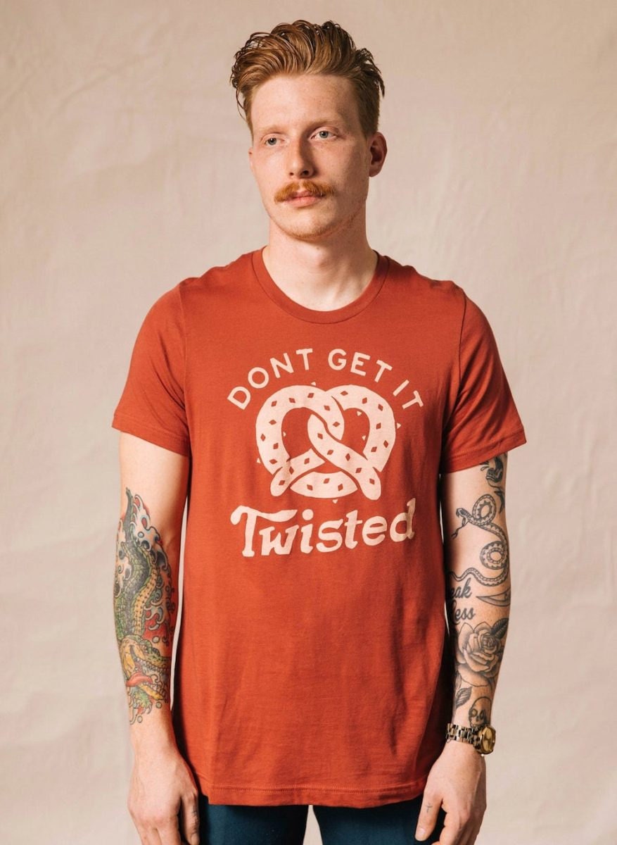 "Don't Get It Twisted" unisex fall fashion pretzel tee from Pyknic Official