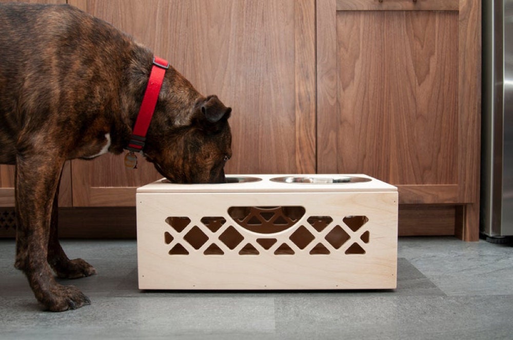 A personalized dog bowl crate from WAAM Industries