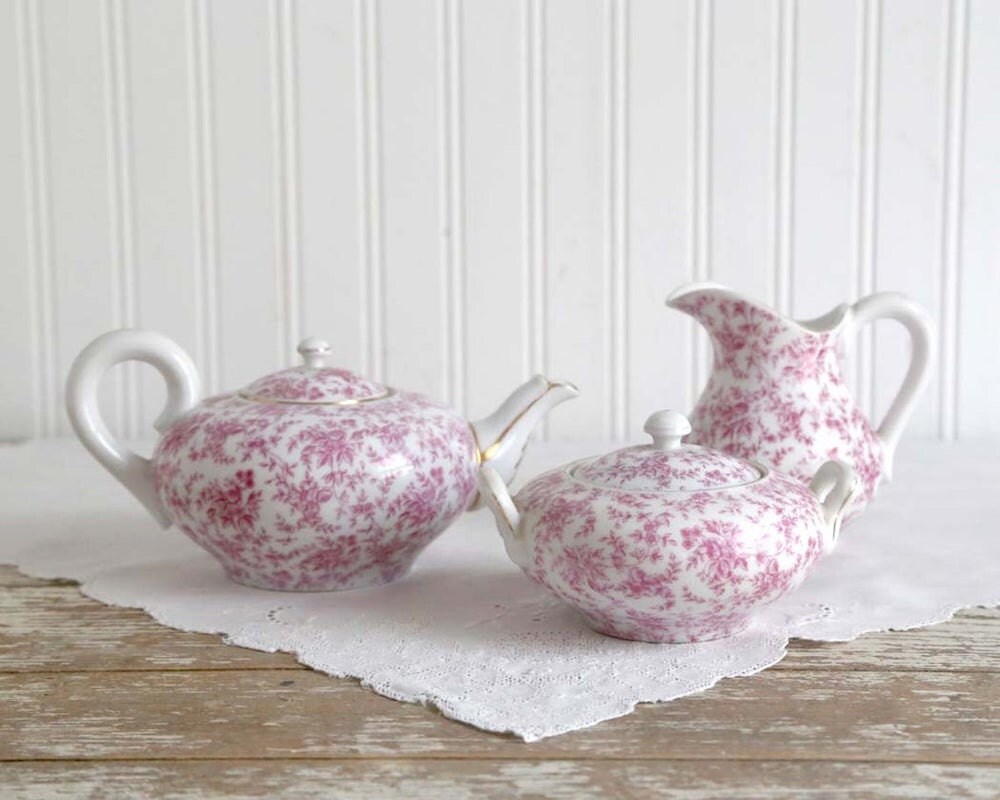 Vintage teapot, creamer, and sugar holder from The Heirloom Shoppe