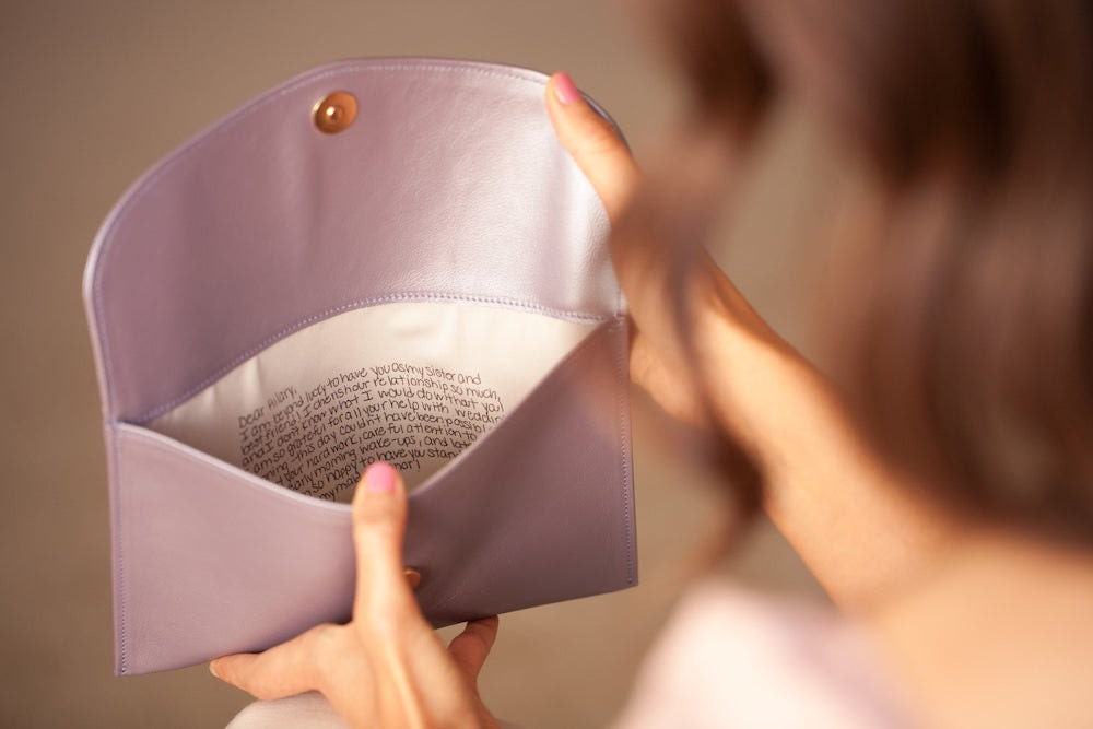 Personalized leather clutch from Fontém