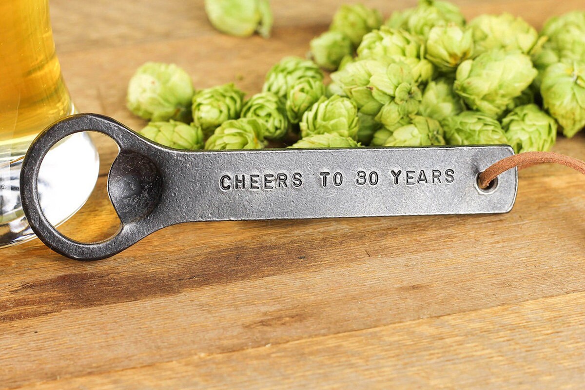 Personalized hand-forged bottle opener from Black Dog Iron Works, on Etsy