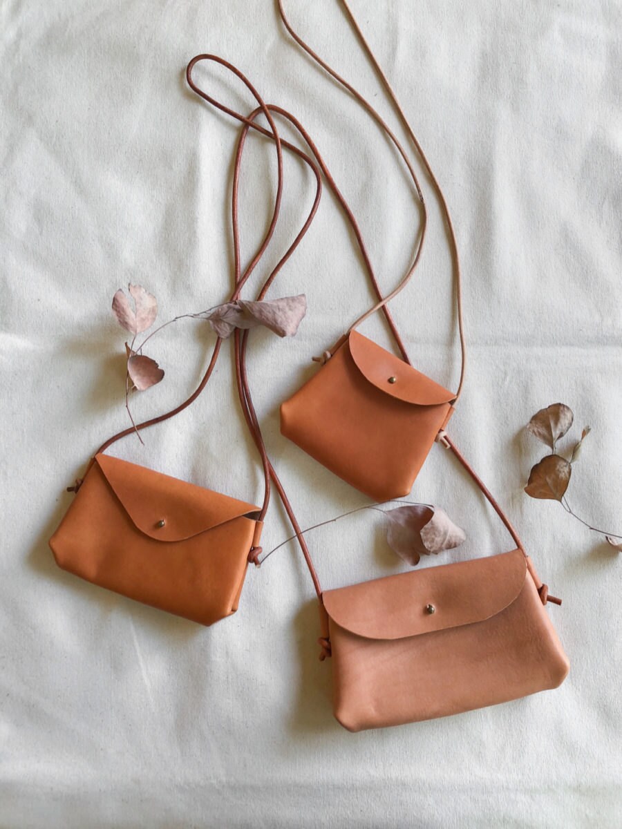 Assorted leather handbags from Small Queue