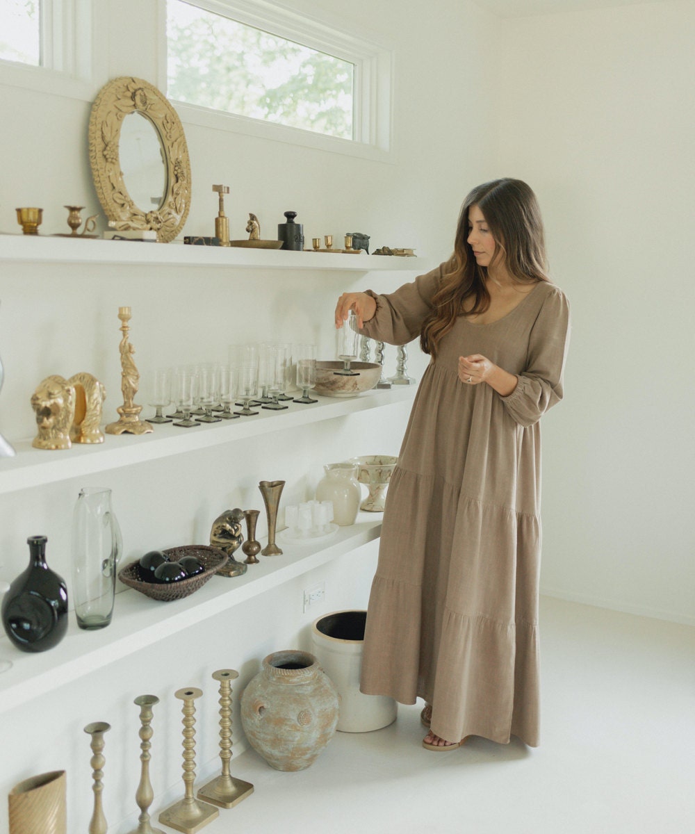 Vintage seller Mara Caballero organizes her stock.