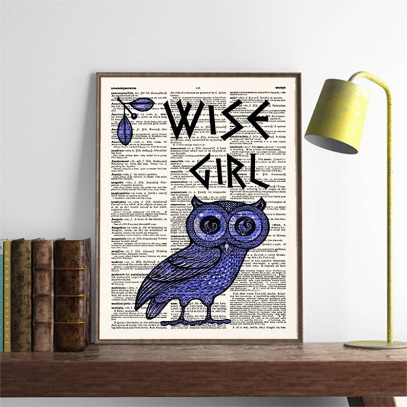 May include: A blue owl illustration with large eyes on a vintage dictionary page. The text "WISE GIRL" is written in a stylized font above the owl.
