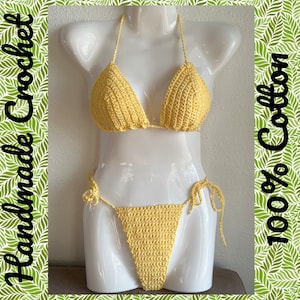 May include: A yellow crochet bikini set made of 100% cotton. The top is a triangle style with adjustable straps. The bottom is a high-cut style with ties on the sides.