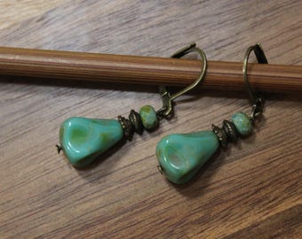 Hangoorbellen turkoois tsjechisch glas: hendel achterkant antiek messing