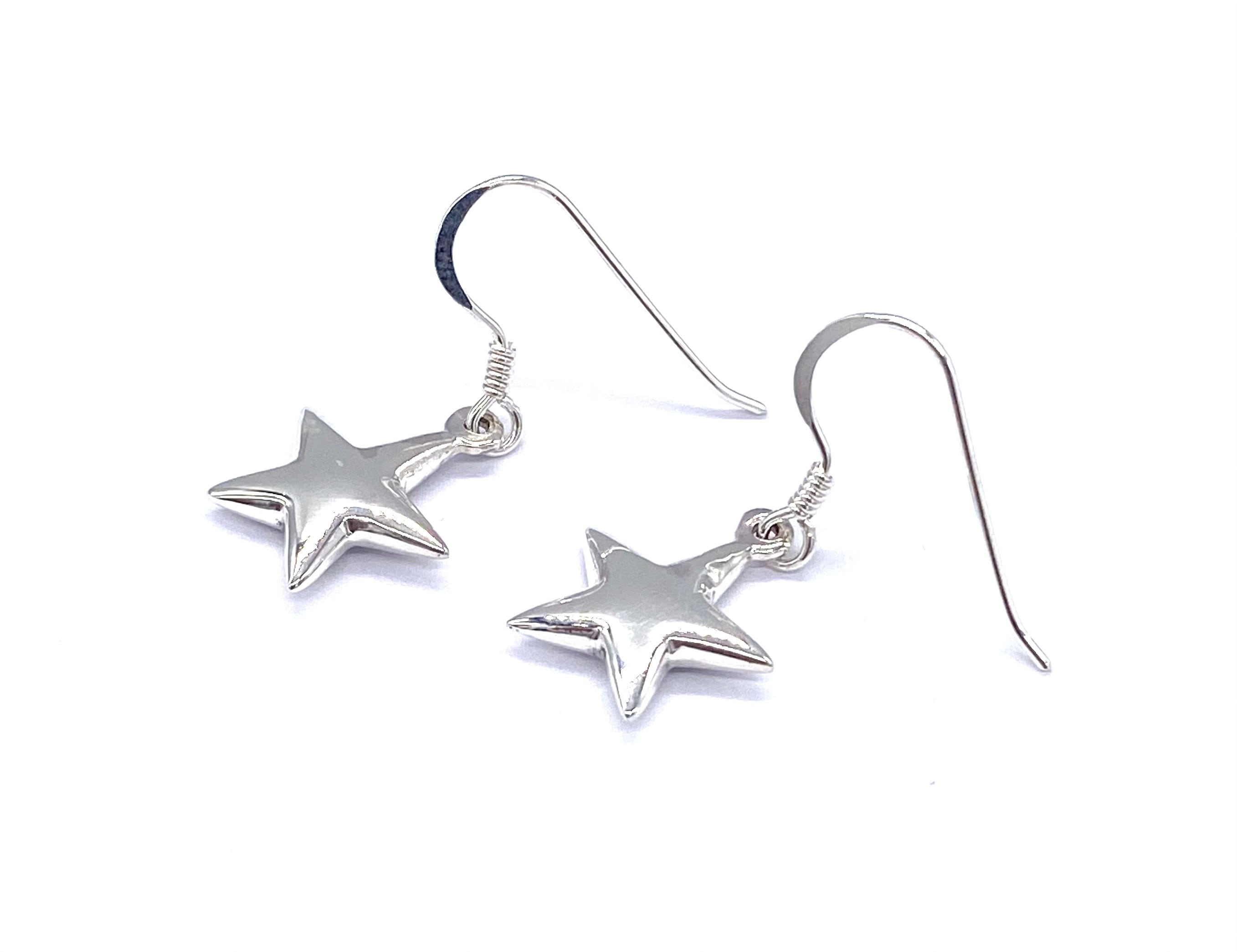 Silver dangle star earrings deals