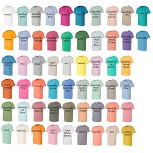 May include: A chart of 48 different colored t-shirts with text labels describing the color of each shirt. The colors include white, mint, teal, gold, pink, silver, cream, ash, yellow, green, blue, orange, coral, peach, mauve, brown, gray, and tan.