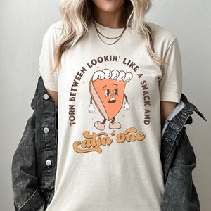 Thanksgiving torn between looking like a snack and eating one shirt | Cozy Thanksgiving | Turkey Day Shirt | Comfort Color