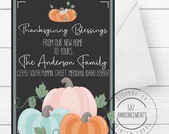 May include: Thanksgiving announcement card with a black background, featuring a pumpkin illustration and the text "Thanksgiving Blessings." The card includes the family name and address. A white envelope is included.