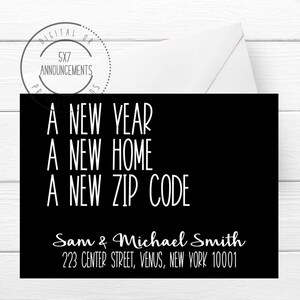 May include: Black announcement card with white text: "A NEW YEAR, A NEW HOME, A NEW ZIP CODE." Below, it reads "Sam & Michael Smith, 223 CENTER STREET, VENUS, NEW YORK 10001." A white envelope is visible.
