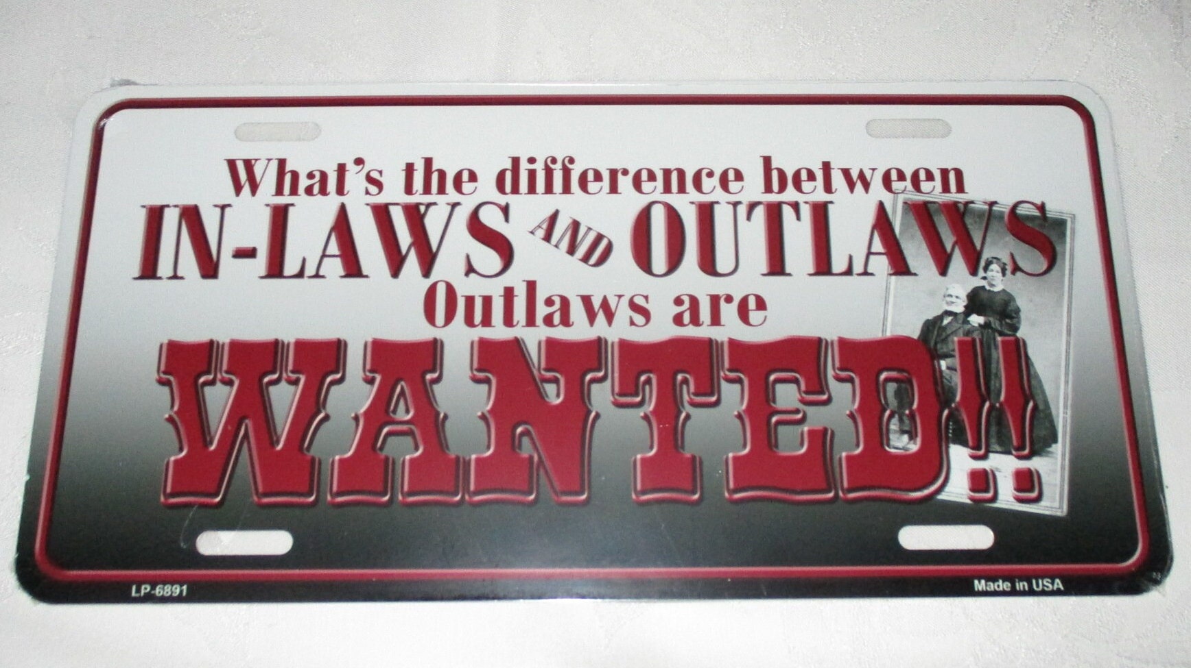 Difference Between Inlaws & Outlaws OUTLAWS ARE WANTED Metal License Plate New Funny Hilarious
