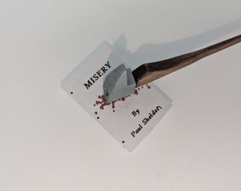 Misery novel with Axe - (free shipping)