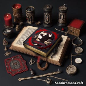 May include: A black leather-bound journal with a red and gold design. The cover features a silhouette of a bat and the word "Dracula" in gold lettering. The journal is surrounded by various decorative items, including candles, a book, and a small box.