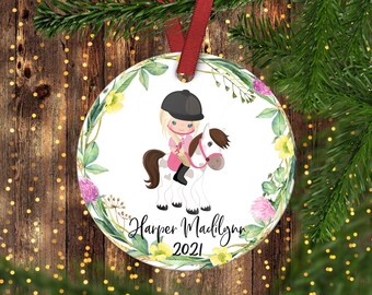 Ornamento per equitazione per bambini. Ornamento di Natale per l'equitazione della ragazza