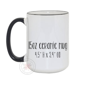 May include: White ceramic mug with a black handle and black rim. The mug is 15oz and measures 4.5" H x 3.4" OD.
