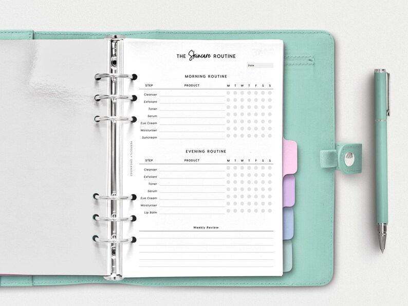 May include: A white printable skincare routine tracker with a black and white design. The tracker includes sections for morning and evening routines, with spaces to list products and check off days of the week. The tracker is in a binder with silver rings.