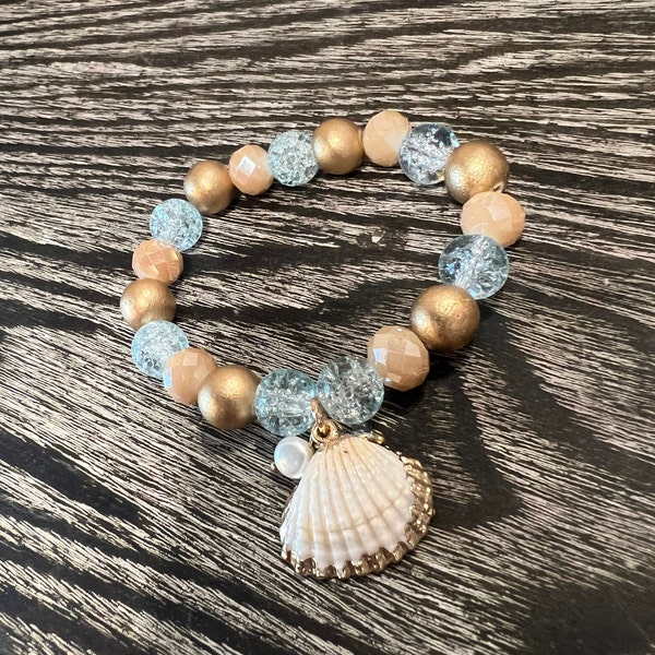 Gold trimmed seashell and pearl charm bracelet with aqua and gold beads