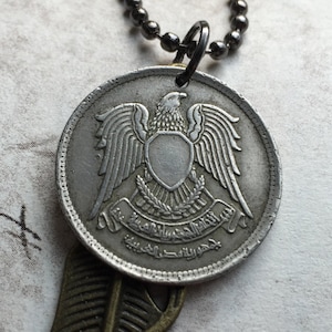 EGYPT coin pendent w/feather charm on a 24 inch ball chain necklace. BOGO Free - sellers choice