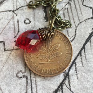 GERMAN 10 PFENNIG coin charm w/wire wrapped crystal on a 24 inch chain necklace. BOGO Free - sellers choice