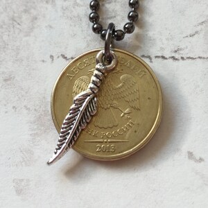 RUSSIAN 2013 coin pendent with feather charm on a 24 inch ball chain necklace. BOGO Free - sellers choice