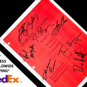 May include: A red script page from the TV show Stargate: Atlantis, signed by the cast and crew. The script is for "The Siege Pt. 3" and is written by Martin Gero. The production number is #02359H.