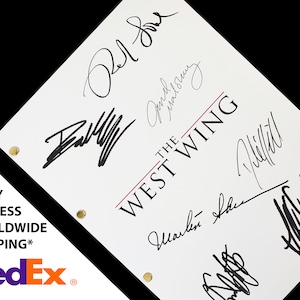 May include: A white script with the title "The West Wing" in black and red lettering. The script is signed by several people, including Aaron Sorkin, Martin Sheen, and Allison Janney.